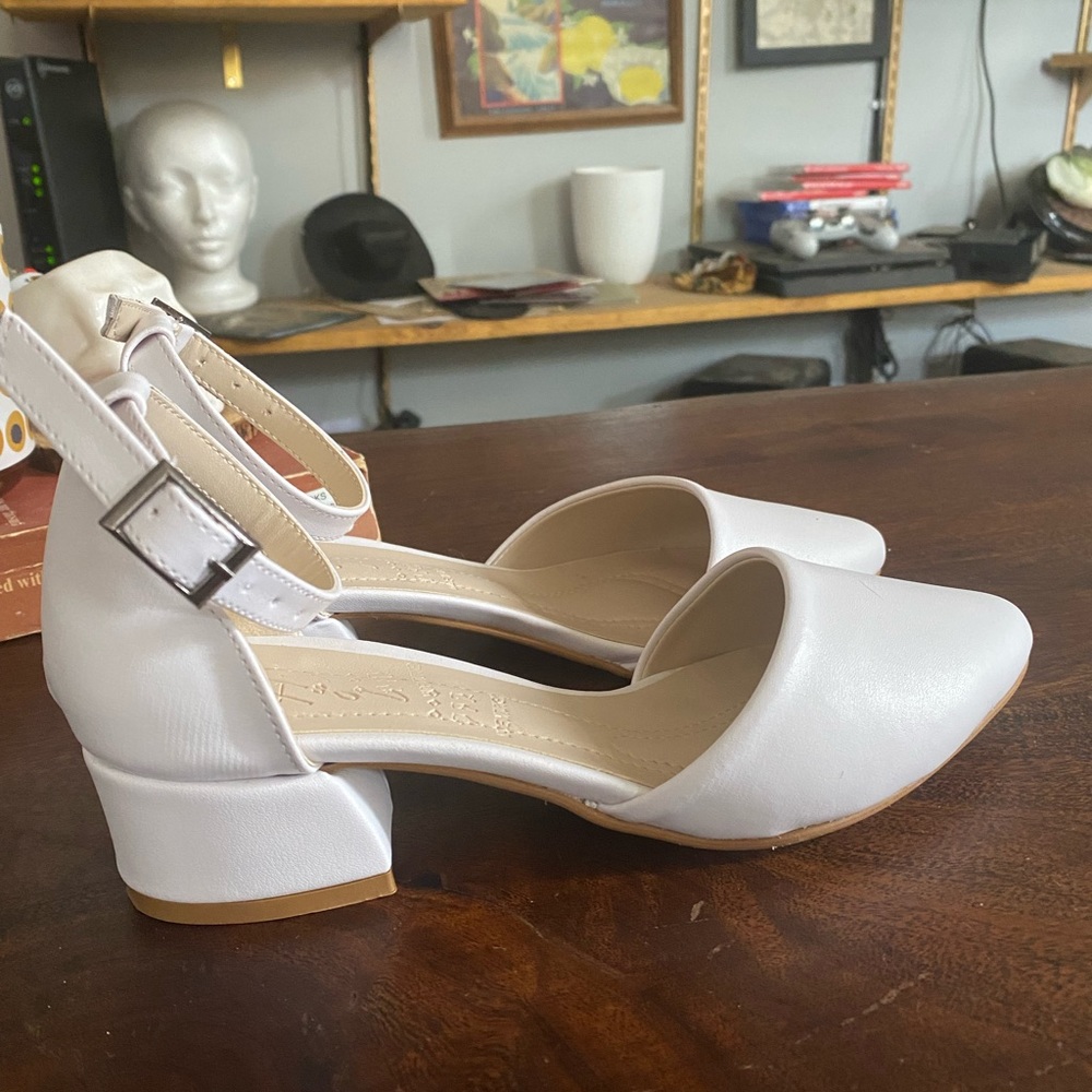 White flats with buckle. Size 6!